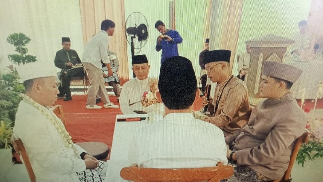 Disaksikan Wakil Bupati, Kepala KUA Kecamatan Pinggir Pimpin Prosesi Akad Nikah di Desa Muara Basung